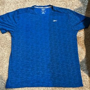 blue reebok shirt